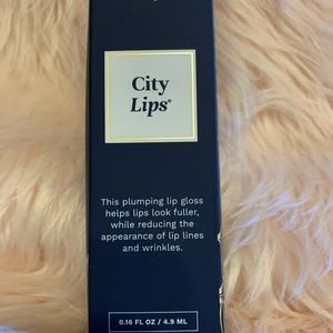 NIB City Lips clear lip plumping gloss